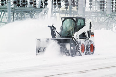 Bobcat Plowing Snow