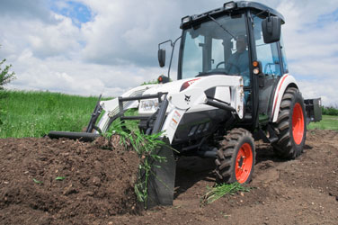 Bobcat_CT335_with_Bucket_and_Box_Blade